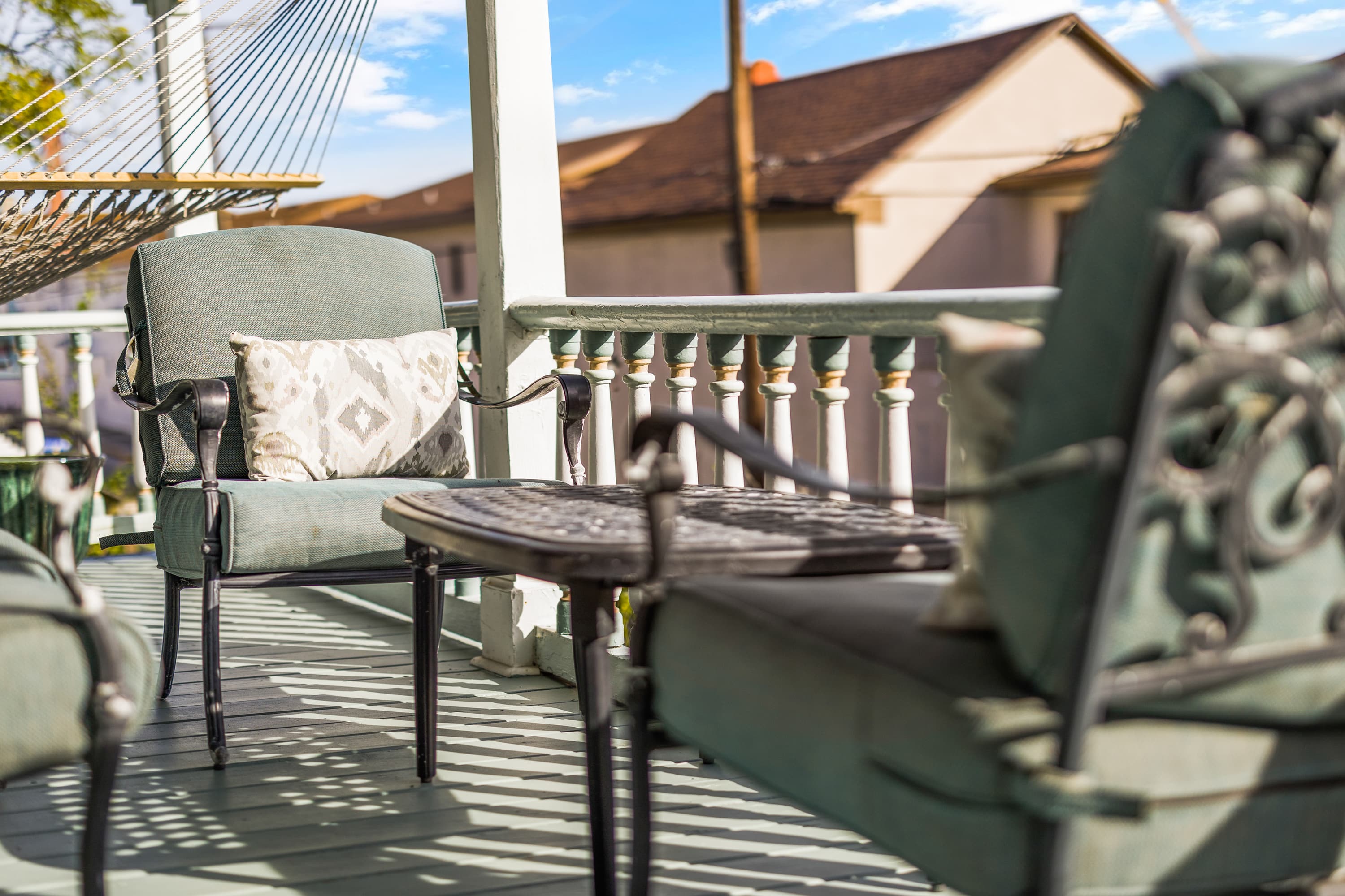 porch with 2 chairs and small table